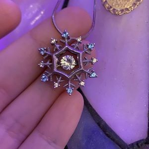 Kay’s Rhythym in Motion Topaz Snowflake Necklace